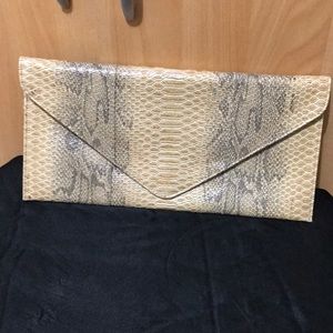Faux python clutch
